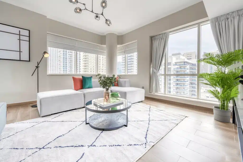 living room view with a sofa and a center table