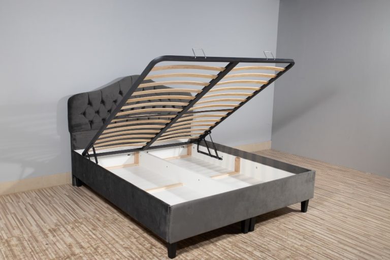 A wooden-framed bed featuring a comfortable mattress, showcasing a simple and elegant design.