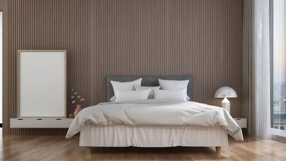 Modern bedroom featuring a wooden floor and large windows that allow natural light to fill the space.